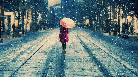 girl-in-the-rain-walking-on-the-snowy-bstreet-high-definition-wallpaper-for-desktop-background-download-free